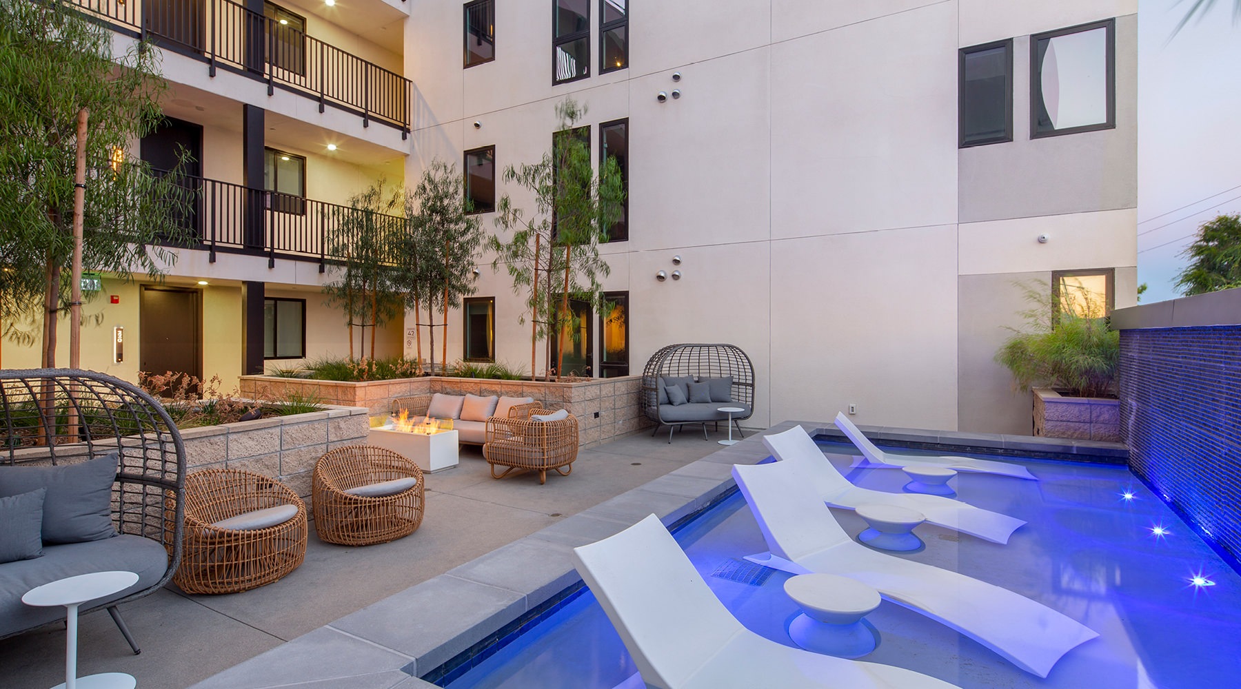 Cutting-edge amenities at your fingertips a pool and a sitting area