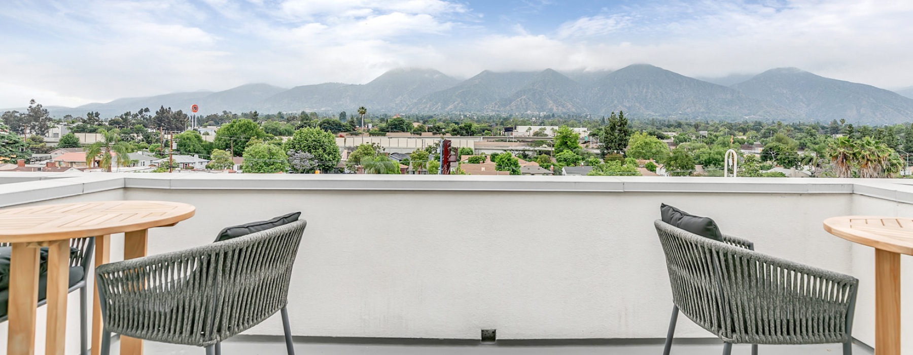 Rooftop seating with tables and chairs
