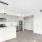 Well-lit kitchen with ample counter space