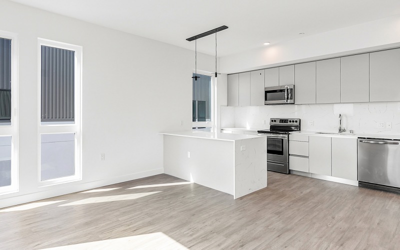 Well-lit kitchen with ample counter space