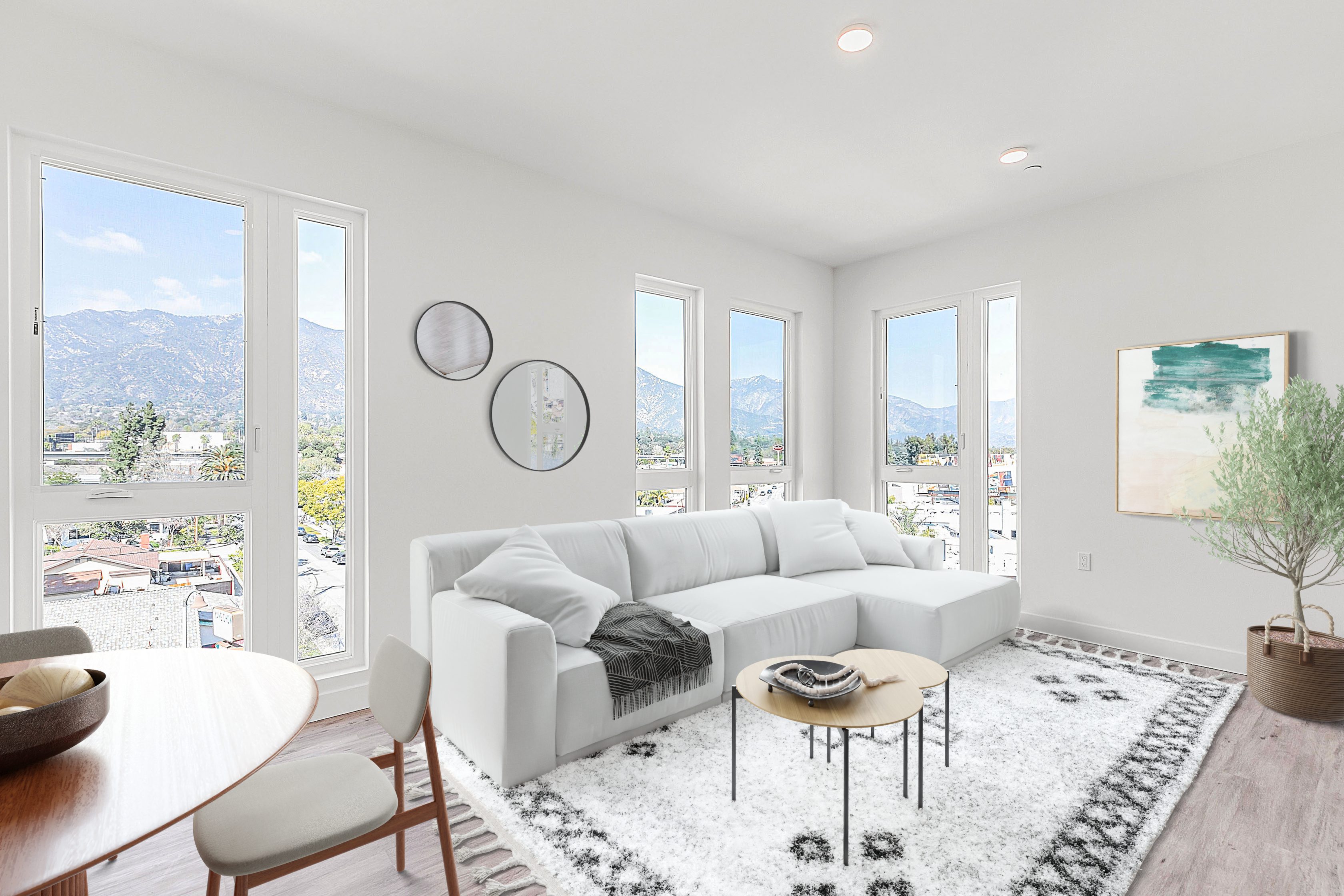 A rendering of a living room with a white couch and table in an apartment in Pasadena, California.
